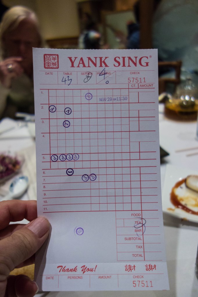 The bill--as each dish is dropped off, a mark is made.  They add it all up at the end.