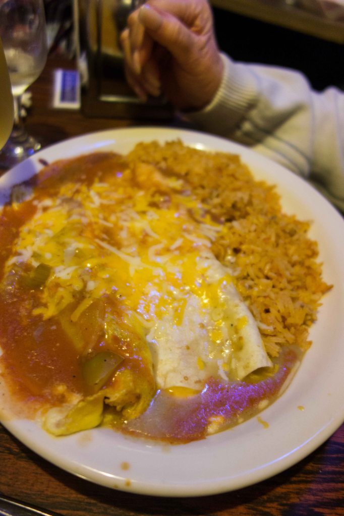An enchilada and a chile relleno