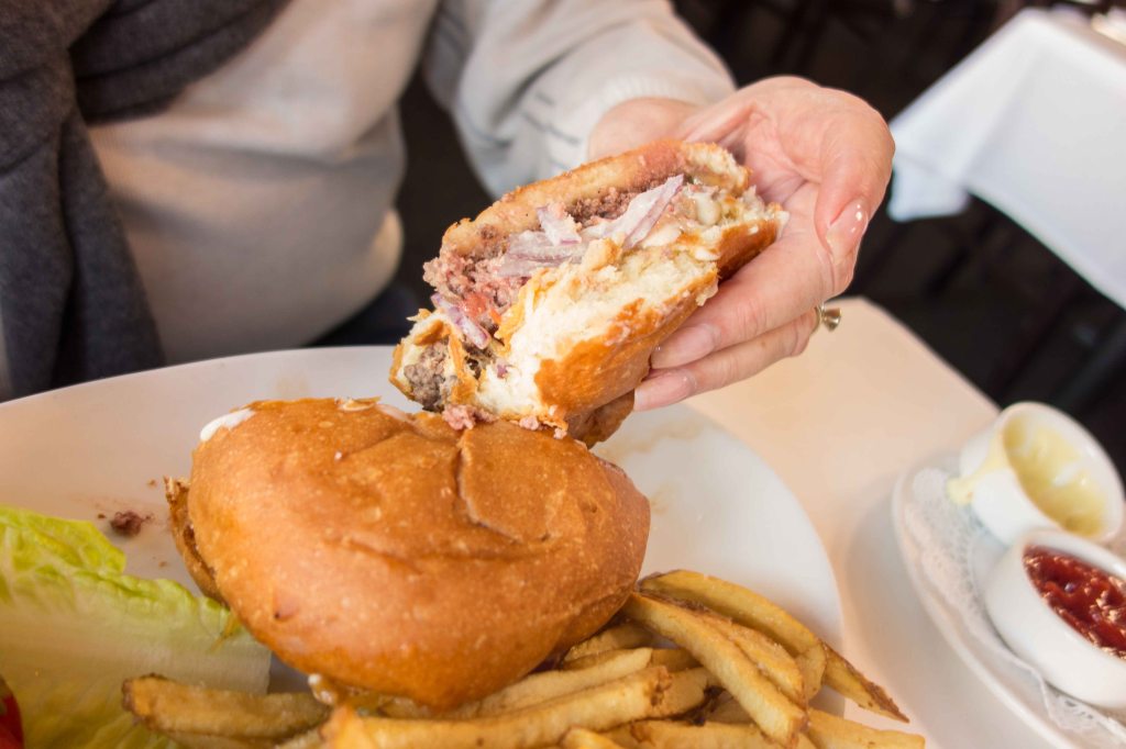 A medium rare burger properly cooked.