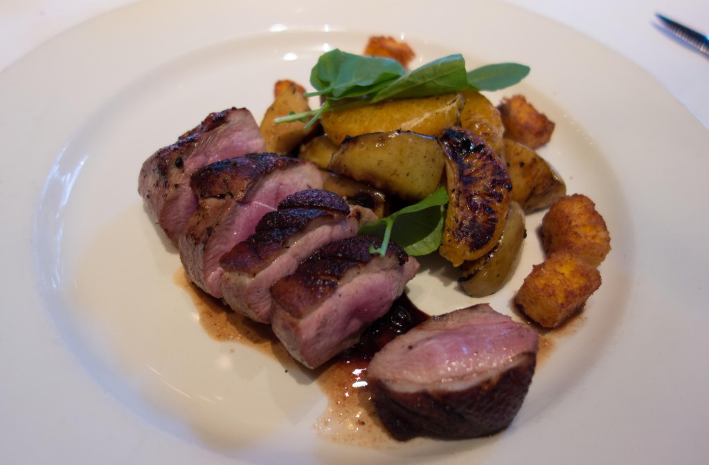 Duck breast with grilled mandarin oranges and apples