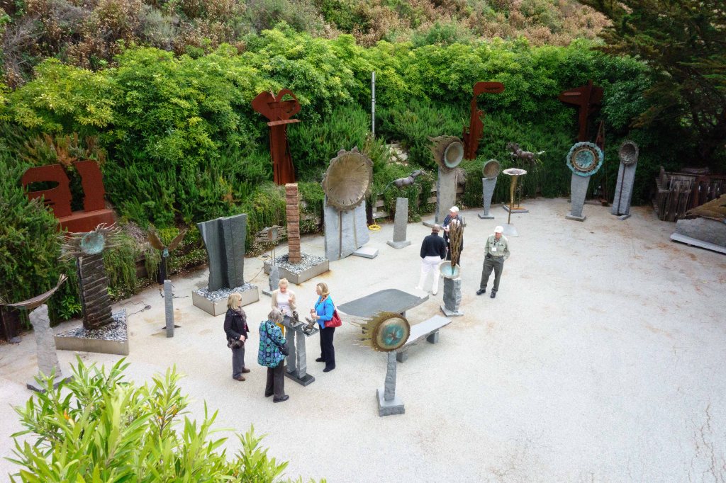 Large sculpture fills the rear patio.