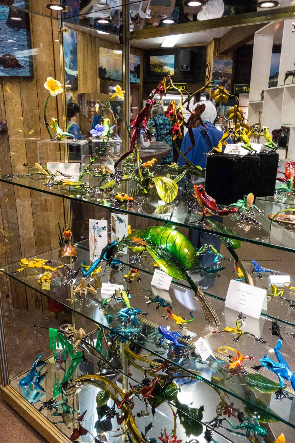 An etagere full of gaudy enameled frogs.  Matisse would not be envious.