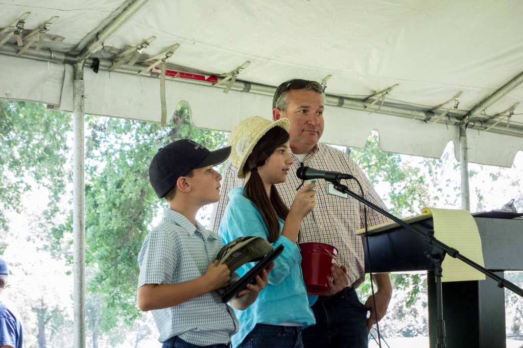 Frank and the kids running the raffle.