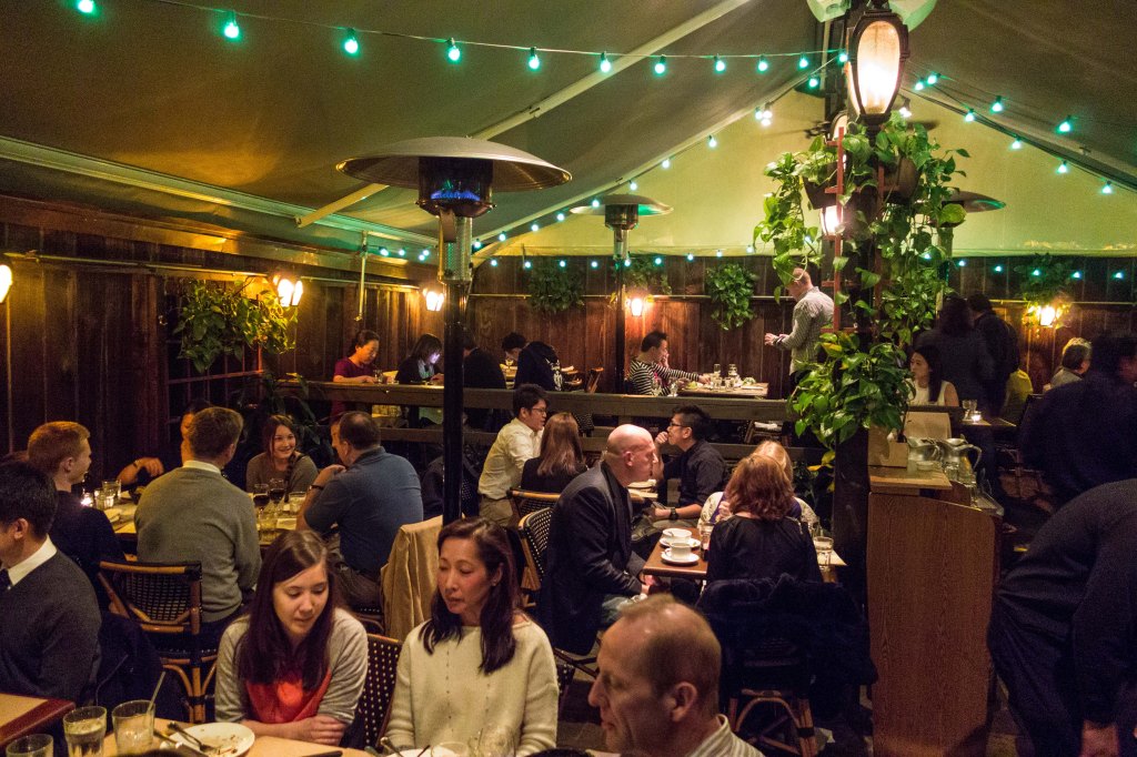 The very colorful indoor/outdoor back room of Isa