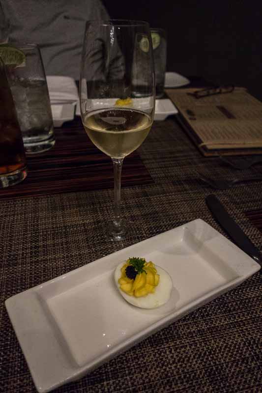 Sparkling New Mexico wine and a white truffle devilled egg with caviar