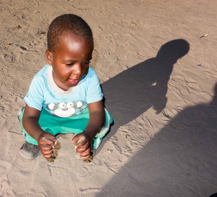 A little kid in a local village.  No reason, I just like kids.