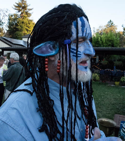 He claims the ears are his own.  Definitely saw the movie too many times.