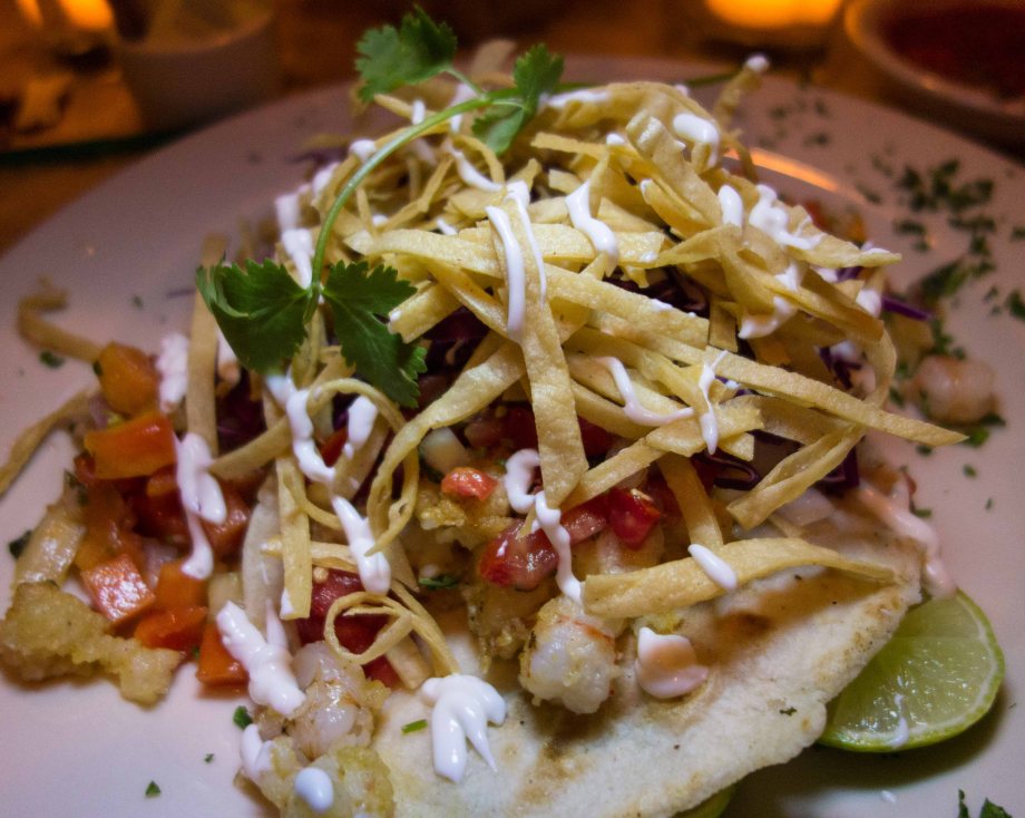 There ate excellent rock shrimp tacos under there somewhere.