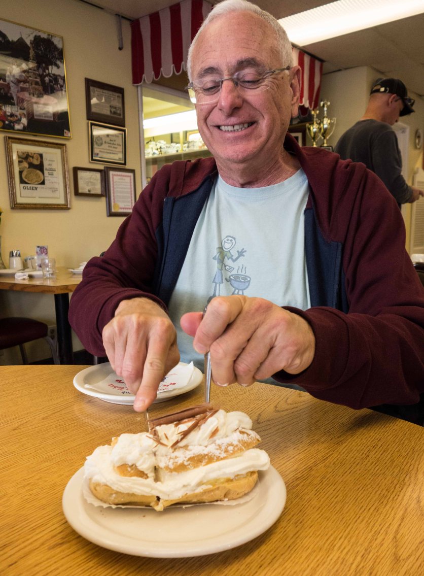 A gleeful Ed attacks his puff pastry.
