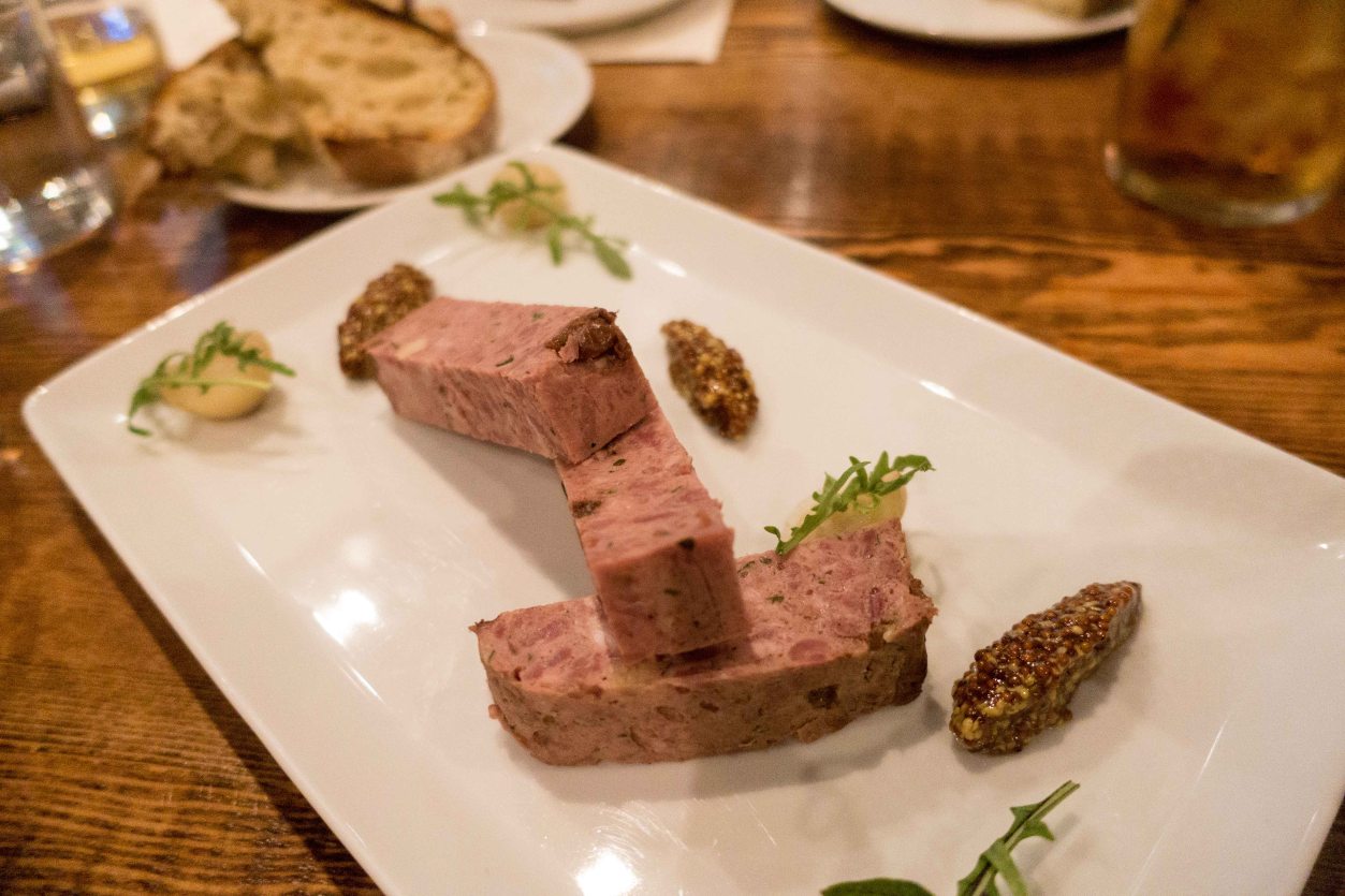 pate de cerdo, pickled onion, whole grain mustard on grilled bread.