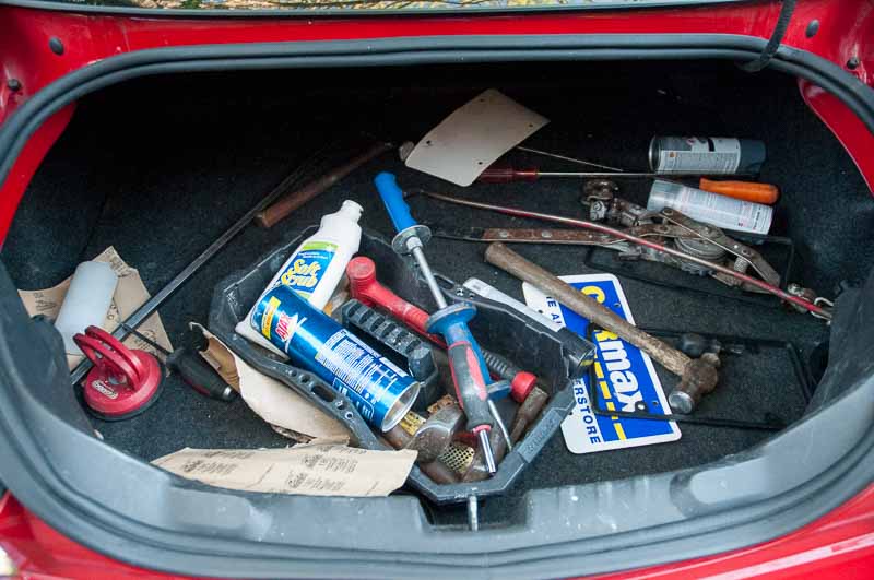 The trunk of the Camaro, with everything they needed.