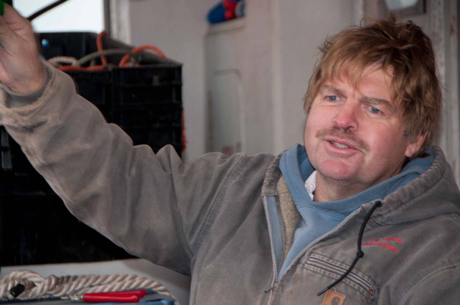 I think he looks like Patton Oswalt.