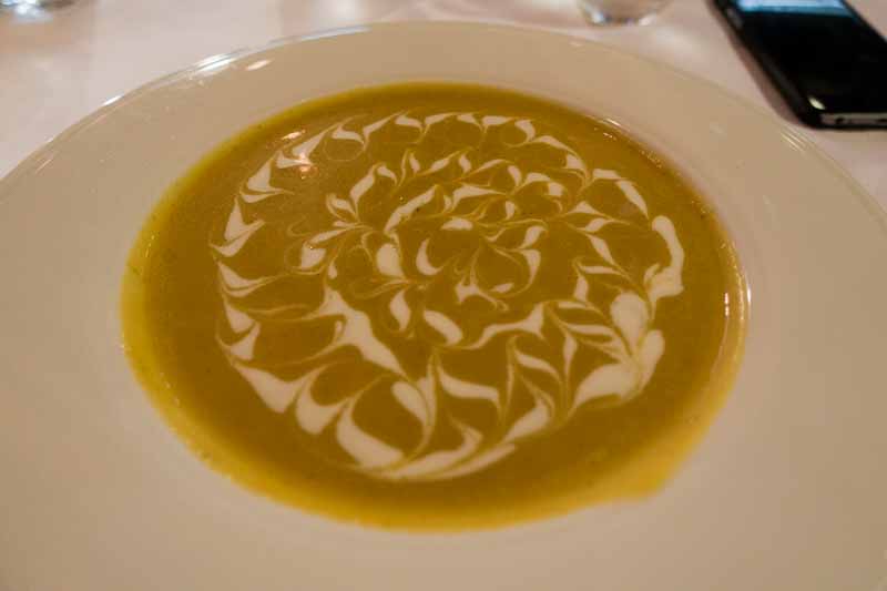 Butternut squash soup decorated with creme fraiche